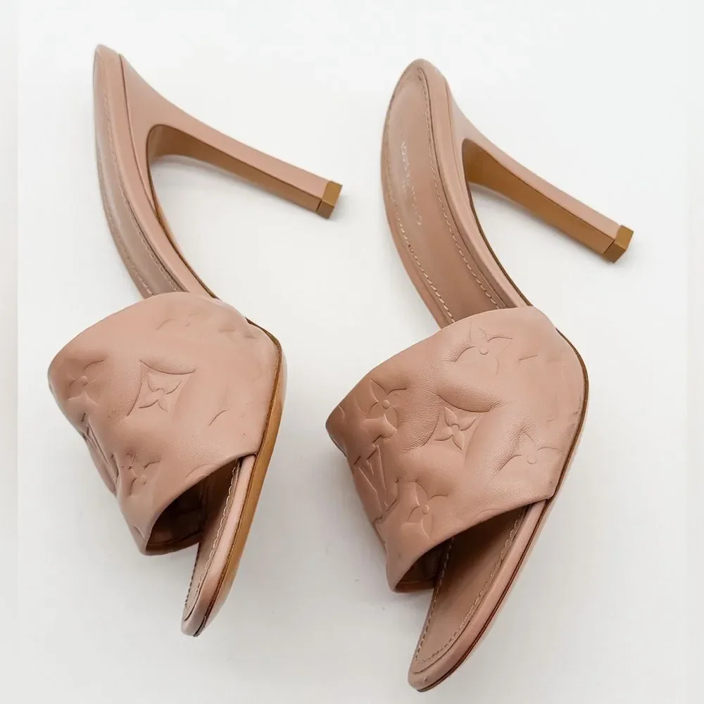 Louis Vuitton Revival Mule Heel Sandals Beige
Monogram Embossed Leather EU 38 - Picture 8 of 14